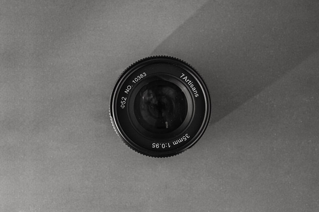 7 Stunning 7artisans Vintage Lens Photos REVEALED! 5 7artisans vintage lens - a black and white photo of a camera lens