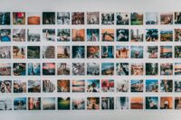 facial recognition - A vibrant wall collage featuring various travel-themed polaroid photographs.