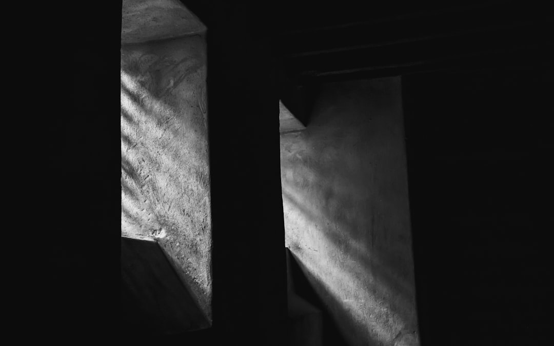 7 Stunning 7artisans Vintage Lens Photos REVEALED! 8 a black and white photo of a window in a building