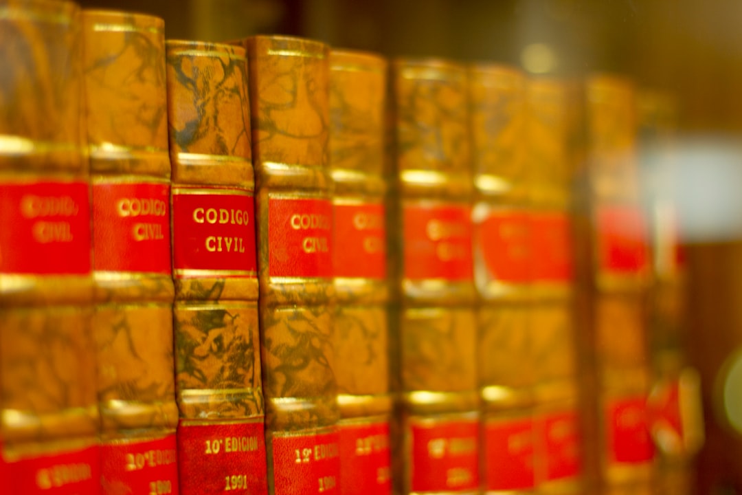 7 Surprising Ways AI Art Isn’t Like Photography 8 a row of red and yellow books on a shelf