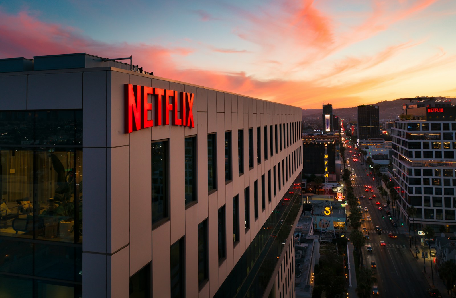 Movie Profits: Who Really Gets Paid When A Movie MAKES Millions? 8 white and black concrete building during night time