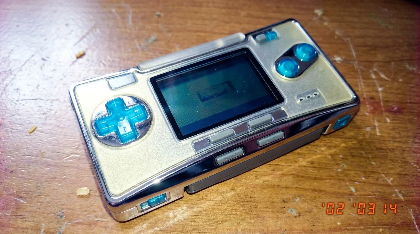 Y2k Style: Your 5 Essential Pieces 14 A handheld device featuring chrome and frosted polycarbonate, with vibrant, y2k style (AI Render Pro)